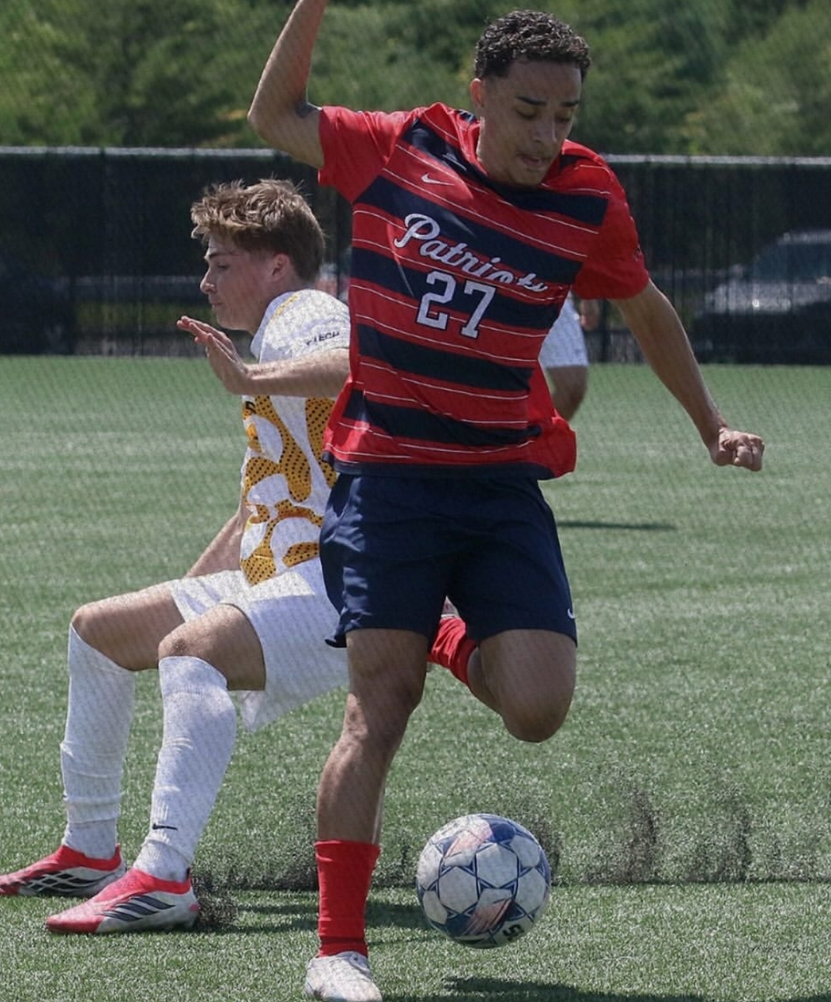 Vinicius Serafim works past a defender